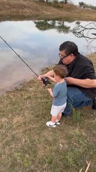 Young angler fishing at the lake